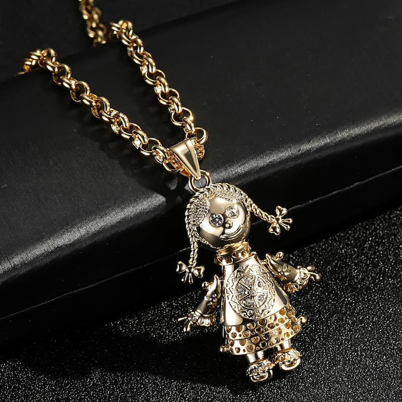 GOLD RAG DOLL PENDANT CLEAR STONES